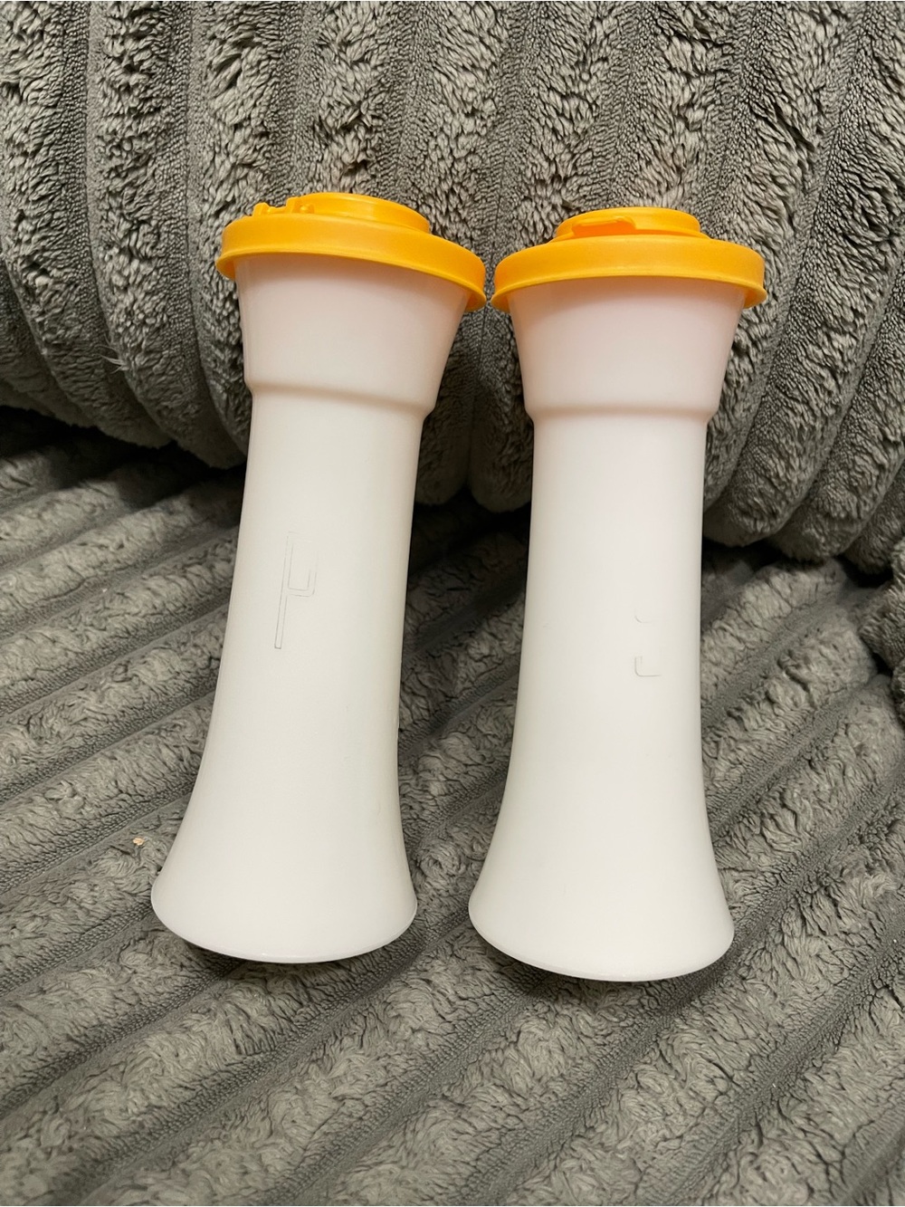 Tupperware White and Yellow salt and pepper shaker